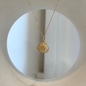 Elly’s 8.1mm South Sea deep tea Gold ocean Pearl Shell pendant: Extreme luster mirrored, 1.1x1.5cm, S925 silver pendant.
