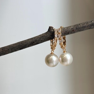 Elly’s 10.9mm Edison white Pearls Earrings Hoops: Extreme luster Mirrored, 3cm high, S925 silver earrings.
