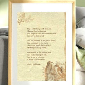 May include: Framed print featuring a poem by Emily Dickinson, with a light beige background and a wooden frame. The poem text is in black, with illustrations of birds in the lower right corner. The frame is approximately 12x16 inches.