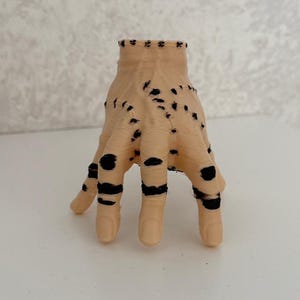 3D Printed Hand Figurine | Horror Movie Inspired Decor | Skin Tone PLA with Hand-Painted Stitches | Collectible Prop