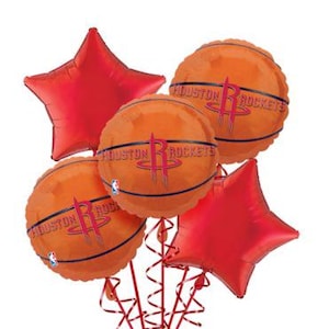 May include: A set of five balloons featuring the Houston Rockets logo. Two of the balloons are red stars, and three are orange basketballs with the Houston Rockets logo and the words "Houston Rockets" printed on them.