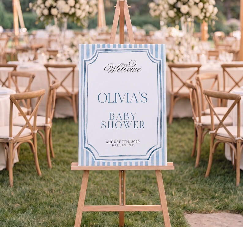 Editable blue striped baby shower welcome sign template with watercolor border, classic frame details, and elegant script lettering.