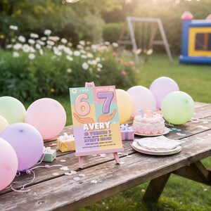 May include: A birthday party scene with a wooden picnic table adorned with pastel balloons, a small cake, and a sign that reads "Avery is turning 7". The scene is set outdoors with a garden and a bouncy house in the background.