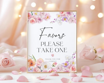 May include: A gold-framed sign with a floral design and the text "Favours Please Take One Thank You For Coming!"