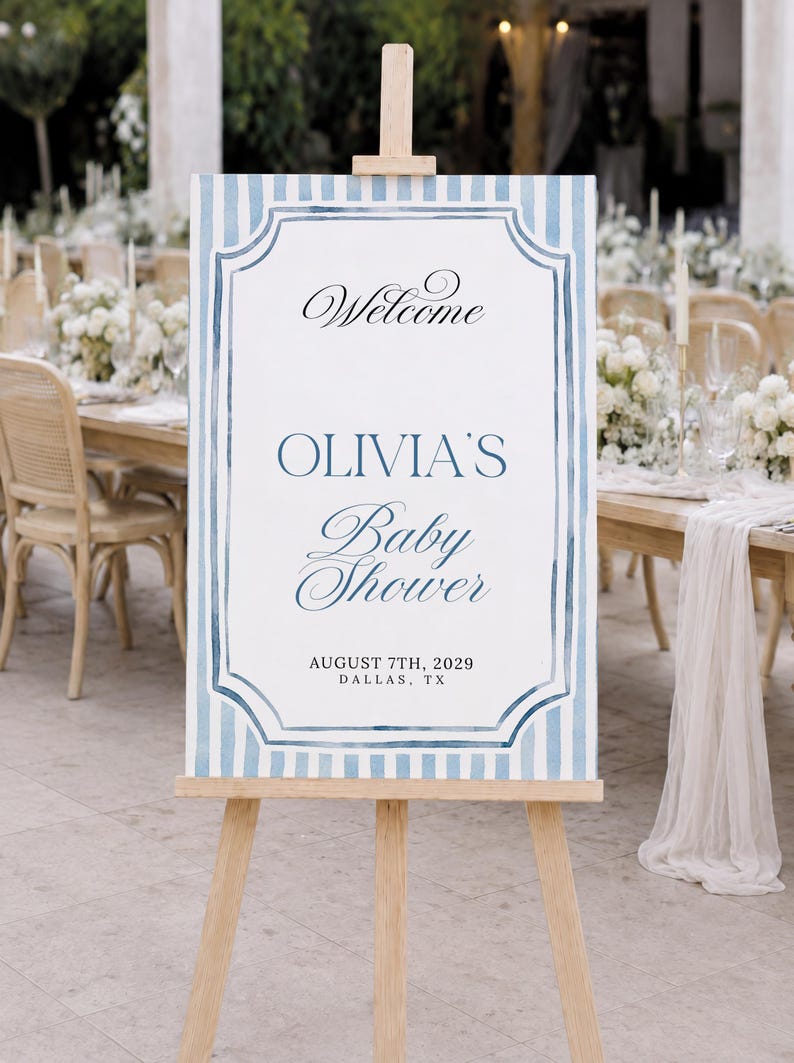 Editable blue striped baby shower welcome sign template with watercolor border, classic frame details, and elegant script lettering.