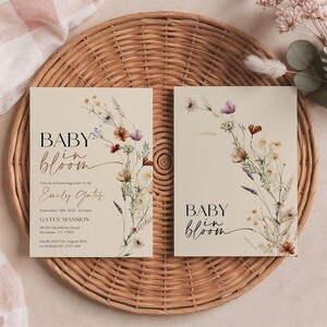Editable Baby in Bloom baby shower invitation with watercolor wildflowers and boho floral design on a neutral background.