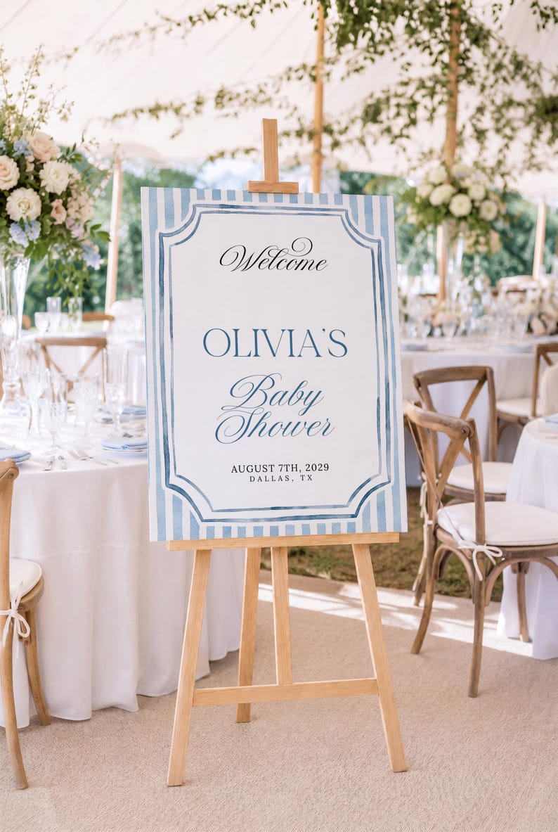Editable blue striped baby shower welcome sign template with watercolor border, classic frame details, and elegant script lettering.