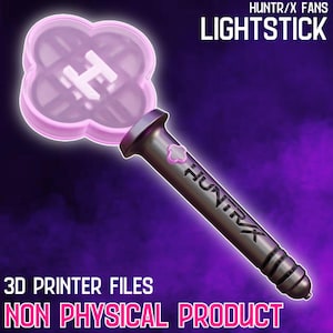 May include: A purple and silver lightstick with a four-leaf clover shaped head, featuring the letter "H" inside. The text "HUNTR/X FANS LIGHTSTICK" is displayed at the top, with "3D PRINTER FILES NON PHYSICAL PRODUCT" at the bottom.