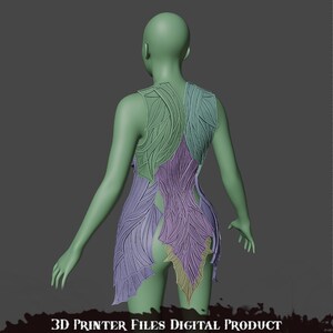 May include: 3D printed model of a dress with a leafy design. The dress is made up of multiple pieces that are printed separately and then assembled. The dress is shown on a 3D model in a back view. The dress is a light green, purple, and brown color.