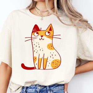 Katzen Minimalismus T-Shirt, klarer Comicstil mit reduzierter Linienführung, charmantem Ausdruck für  Tierfans, Rundhals Unisex Shirt