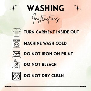 May include: A peach-toned graphic displaying laundry care instructions in black. The text reads: "WASHING Instructions" followed by instructions to turn garment inside out, machine wash cold, do not iron on print, do not bleach, and do not dry clean.