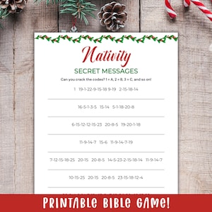 May include: A white printable game sheet with the title "Nativity" in a decorative font. The sheet includes the text "Secret Messages" and a series of coded messages. The bottom of the sheet reads "Printable Bible Game!"