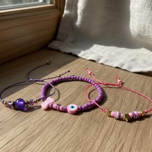Conjunto de pulseras de ojo turco rosa y morado, pulseras de la amistad con dije de mariposa y corona, regalo de joyería con cuentas ajustables