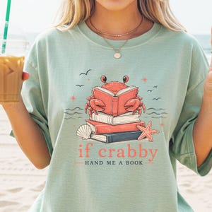 If crabby hand me a book graphic tee for readers who love beach vacations and books