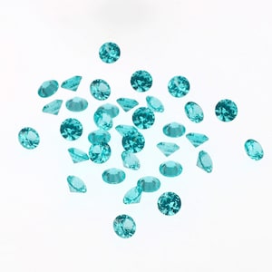 Espinela sintética redonda color Paraíba cultivada en laboratorio