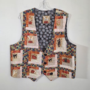 May include: A sleeveless vest featuring a patchwork design with various Halloween-themed illustrations including pumpkins, ghosts, black cats, and witches. The garment has a black interior lining with a white spiderweb pattern and three black buttons.