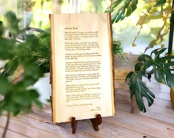 May include: A wooden plaque with a handwritten love letter engraved on it. The letter reads "My dearest [Name], When the moment I met you, my world was filled with sunshine and light. Your smile is the morning sun I long to wake up to, and your embrace is the perfect place to call home..."