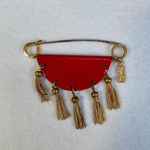 Vintage YSL Safety Pin Brooch – 1980s Yves Saint Laurent Red Enamel & Tassel Statement Pin with Logo Tag
