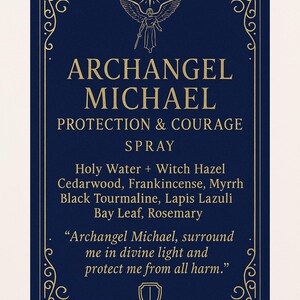 May include: A navy blue card with gold decorative borders and text. The card reads "Archangel Michael, Protection & Courage Spray." Ingredients include Holy Water, Witch Hazel, and essential oils. A quote is also included.