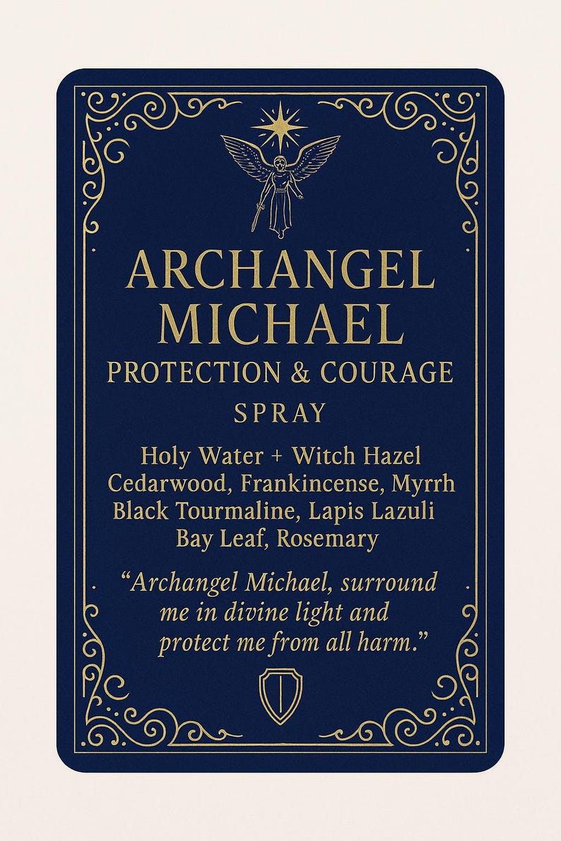 May include: A navy blue card with gold decorative borders and text. The card reads "Archangel Michael, Protection & Courage Spray." Ingredients include Holy Water, Witch Hazel, and essential oils. A quote is also included.