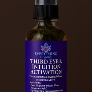 May include: A clear glass bottle with a black spray top filled with a green liquid. The label is purple with white text that reads "EVERYTHING Empath THIRD EYE & INTUITION ACTIVATION" and lists ingredients including mugwort, frankincense, clary sage, lavender, lapis lazuli, and star anise. The label also includes the text "I trust my intuition" and "4 oz".