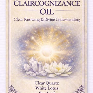 May include: A beige card with the words "CLAIRCOGNIZANCE OIL" in purple. The card features a bright light emanating from the center, with crystals and a white lotus flower at the bottom. Text on the card reads "Clear Knowing & Divine Understanding."