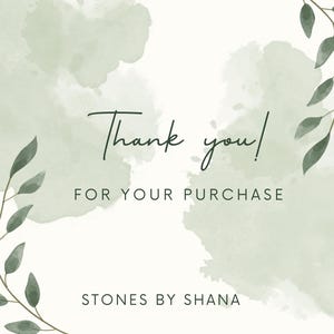 May include: Thank you! for your purchase. Green watercolor background with leafy branches on either side. Stones by Shana.