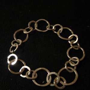 Silver hand forged charm bracelet