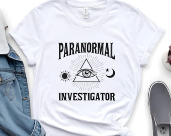 Camiseta de Investigador Paranormal: Diseño de Ojo, Luna y Sol Illuminati