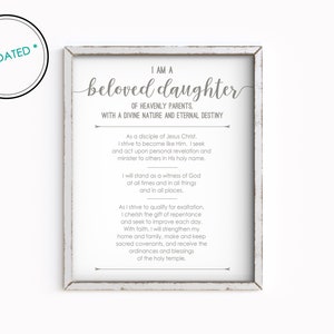 May include: A printable wall art design with a white background and grey text. The text reads "I am a beloved daughter of Heavenly Parents, with a Divine Nature and Eternal Destiny". The text continues with a list of qualities and actions a person can strive for.