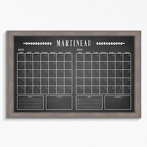 May include: A black chalkboard with a white wooden frame. The chalkboard has two monthly calendars, a to-do list, a notes section, and a grocery list. The chalkboard is labeled "MARTINEAU".
