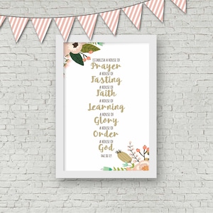 May include: A white framed print with a floral design and gold text. The text reads "Establish a house of Prayer, Fasting, Faith, Learning, Glory, Order, God." The scripture reference is D&C 81:111.