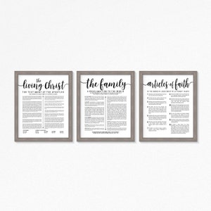 May include: Three framed prints with black text on white paper. The prints are titled "The Living Christ", "The Family: A Proclamation to the World", and "Articles of Faith of The Church of Jesus Christ of Latter-day Saints".