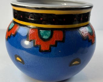 Ecco Terra fine porcelain hand painted pottery pot with swirled sun 5 inches tall and 6 1/2 inches wide diameter