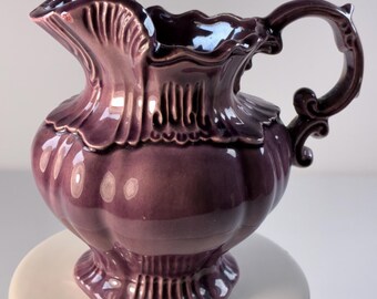 Vintage Purple pottery decorative pitcher with scalloped edges and textured design by Arnel’s Pottery 1985