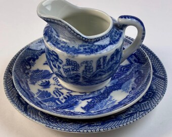 Three pieces of Miniature Japanese Blue And White  Creamer, Saucer and Plate resembles Blue Willow Pattern