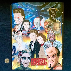 May include: A colourful illustration of characters from the horror film Nightbreed. The characters are depicted in a variety of poses and expressions, with a fiery background. The title "Nightbreed" is written in bold letters at the bottom of the image.
