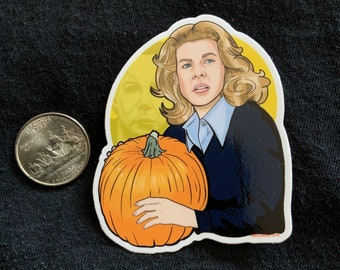 Laurie de Halloween com adesivo de abóbora