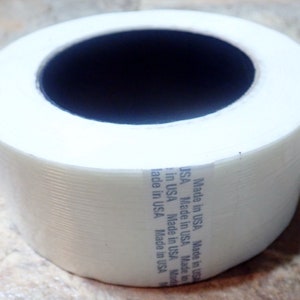 One Roll of White Heavy Duty  fiberglass strapping Tape 2 Inch Wide x 60 Yds (180 Feet) Carton Sealing Box Tape USA Made very strong