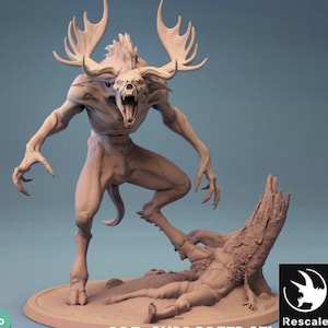 May include: A detailed sculpture of a monstrous creature with large antlers, an open mouth, and sharp claws. The figure is posed aggressively, standing over a fallen figure and a tree stump. The sculpture is a light brown colour.
