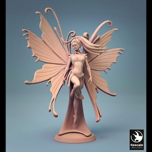 May include: A detailed, peach-colored figurine of a fairy with large butterfly wings. The fairy is posed mid-air, with flowing hair and intricate details on the wings and clothing. The base is a stylized pedestal.