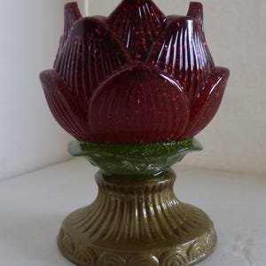 Red glitter rose candle holder. Hold tea light or battery operated candle.