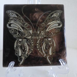 Tile, 4x4 with lasered butterfly.