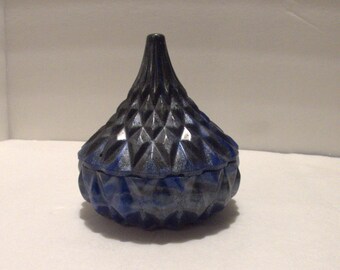 Small jar with lid.