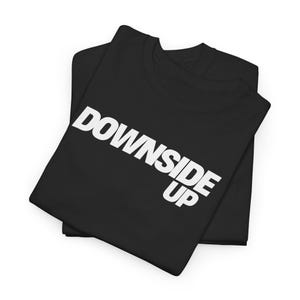 May include: Black t-shirt with white text that reads "Downside Up".