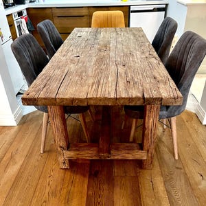 May include: A set of three ceramic mugs with a speckled, matte finish. The mugs are in shades of cream, light gray, and dark gray. Each mug has a simple, minimalist design, perfect for coffee or tea.