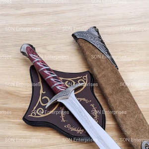 “Elven-Inspired Hilt Design • Beautiful Handcrafted Detail”