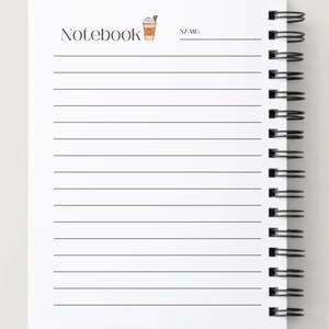 May include: White spiral-bound notebook with lined pages. The word "Notebook" is printed at the top, along with a small illustration of a coffee drink. A line for "NAME:" is also present.