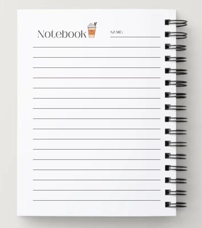 May include: White spiral-bound notebook with lined pages. The word "Notebook" is printed at the top, along with a small illustration of a coffee drink. A line for "NAME:" is also present.