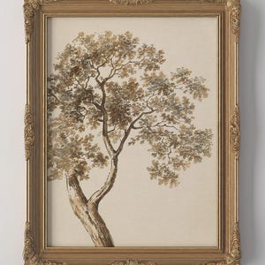 May include: A framed sepia-toned print of a tree with a detailed trunk and branches, filled with leaves. The artwork is set against a cream-colored background and encased in an ornate, gold-colored frame, adding a touch of vintage elegance.